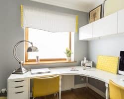 An office interior with white and yellow polkadot Roman Blind Roman Blind
