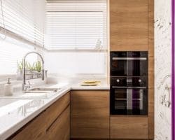 Modern kitchen with white wood venetian blinds. wood venetian blinds.