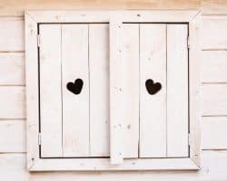 Wooden Window Shutter with heart shaped cut-out. Exterior Wooden Window Shutter